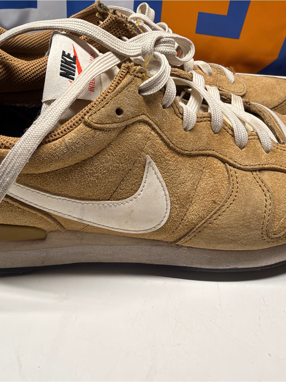 Nike Men’s Tan Suede Athletic Sneakers with White Swoosh